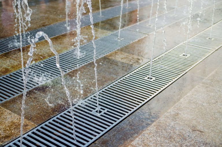 Photo of stainless steel drains and water