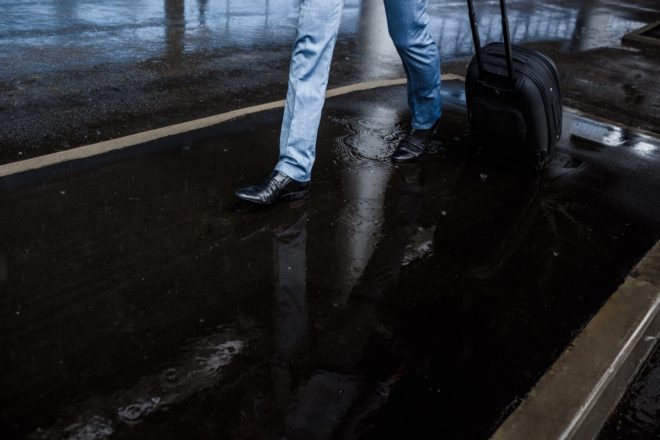 Person walking in water filled street